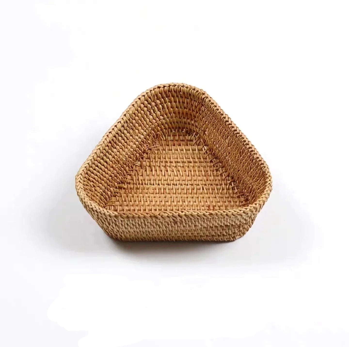 Triangular woven basket on a white background with text boho home decor, rattan basket, handwoven wicker basket, fruit storage box, bread basket, picnic basket, natural storage bin, tea storage box, rustic home organization, farmhouse decor, housewarming gift, boho storage basket