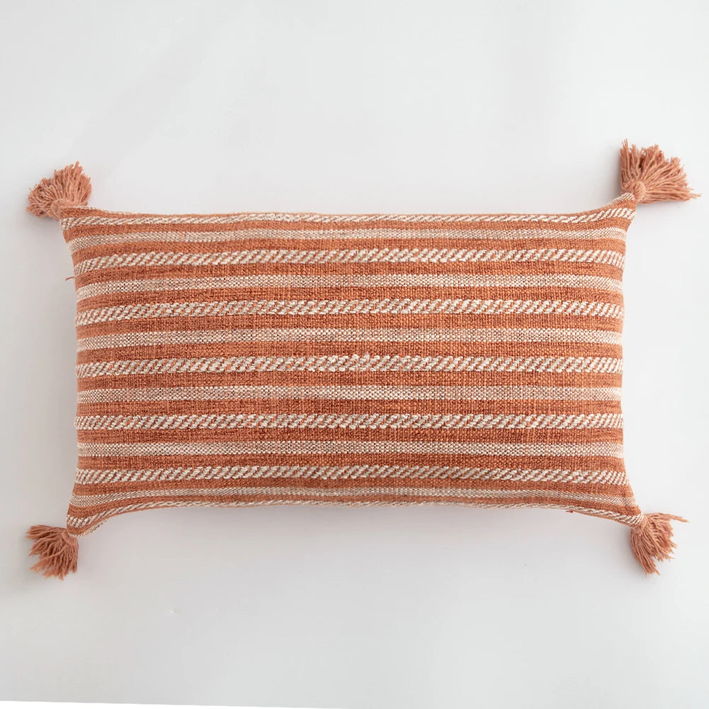 Orange linen tassels cushion cover styled on modern sofa, decorative boho throw pillow for living room, bed, or chair, perfect for cozy home vibes and housewarming gift ideas. Square and Rectangle.
