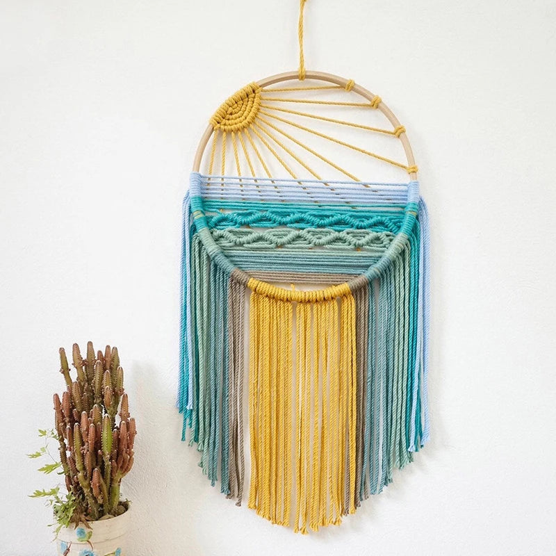 Sunrise & Sunset woven boho wall hanging displayed on wall, Nordic style cotton tapestry featuring warm earthy tones, perfect for boho home decor and eclectic interior design ideas, adds cozy bohemian vibes and textured aesthetic home decor to any living room or bedroom.
