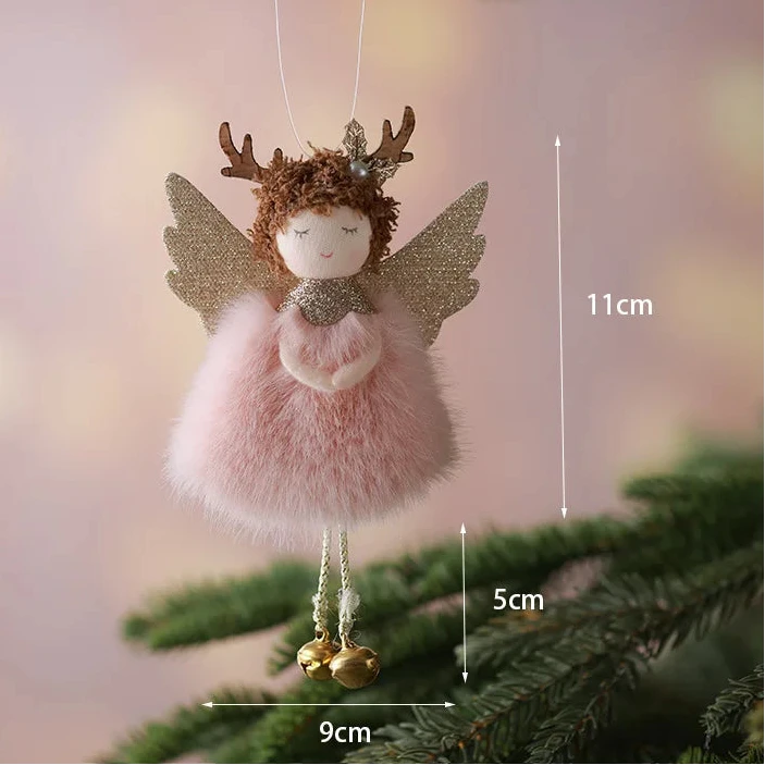 Decorative angel ornament with antlers hanging on a tree branch, with measurements indicated.