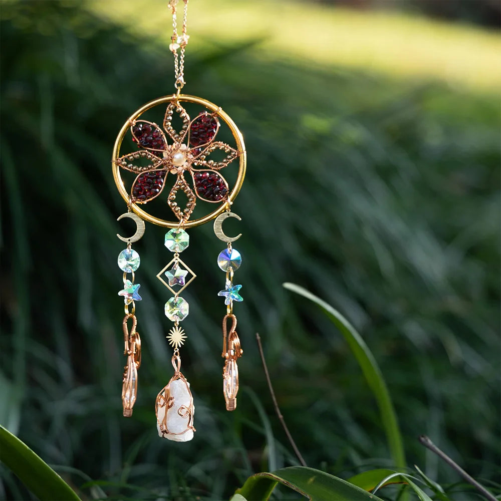 Decorative hanging flower ornament with gemstones and charms against a natural background boho home decor, crystal wind chime, sun catcher for windows, moon prism chime, agate stone hanging, garden art decor, patio hanging decoration, boho housewarming gift, spiritual gift, crystal suncatcher, balcony decor, meditation decor, handmade crystal chime